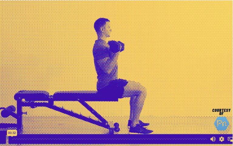 Certified personal trainer demonstrating the seated dumbbell curl exercise for bicep strength