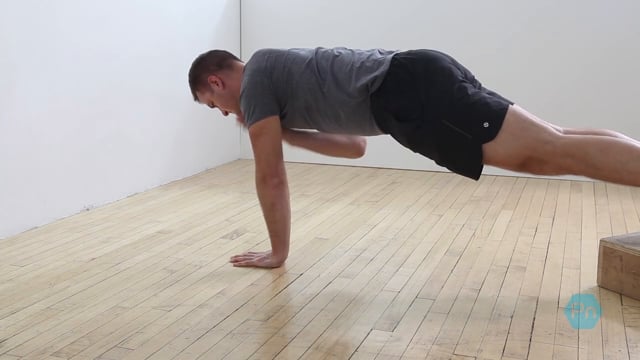 How to Perform The Feet-Elevated Pushup to Single Arm Support