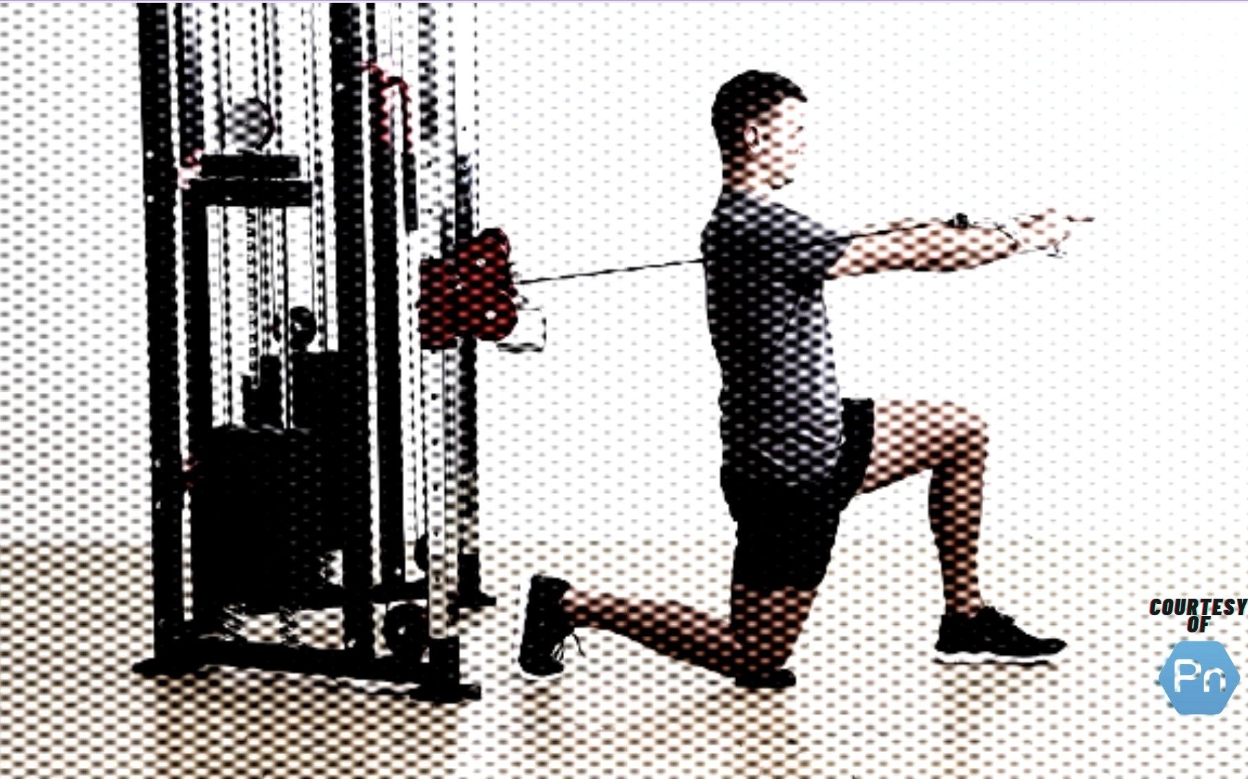 Personal trainer demonstrating a half-kneeling cable press with one arm