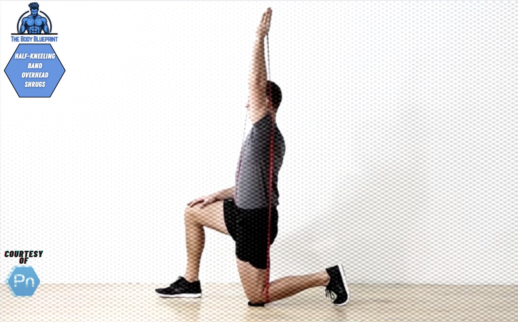 Fitness expert showcasing half-kneeling band overhead shrugs.