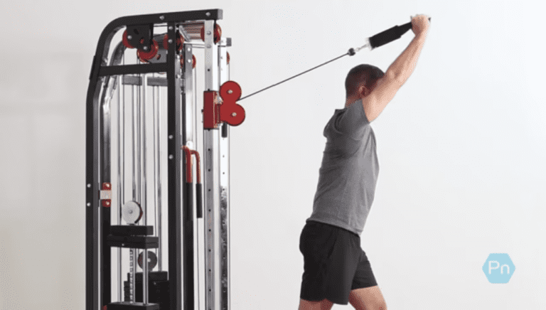 Gravity Is Holding You Back. The Overhead Cable Extension Keeps Tension Where Dumbbells Fail.