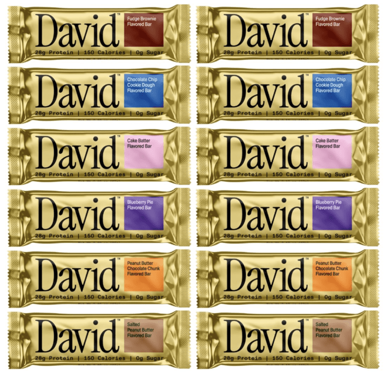 A variety pack of David Protein Bars in six flavors including Fudge Brownie and Cake Batter, each containing 28g of protein, 150 calories, and 0g of sugar.