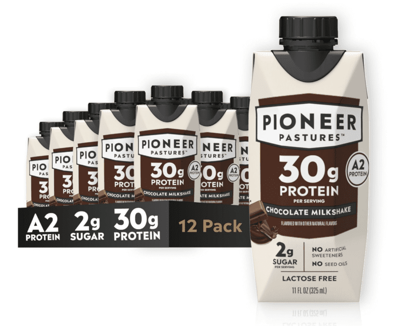 Pioneer Pastures Chocolate Milkshake carton displaying "30g Protein" and "A2 Protein" badges, verifying its lactose-free and seed-oil-free formulation for the review.