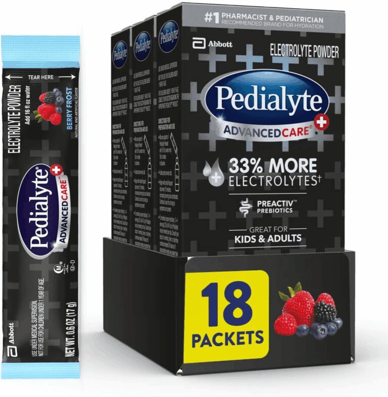 Pedialyte AdvancedCare Plus Electrolyte Powder box and single packet in Berry Frost flavor displaying "33% More Electrolytes," "PreActiv Prebiotics," and 18 packets, verifying its advanced hydration formulation for the review.